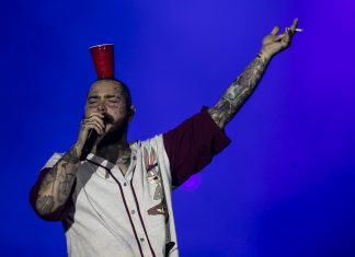 Post Malone chama fã para tocar violão no palco e mantém fama de gente boa no Rock in Rio