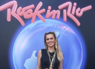 De barriguinha de fora, Carolina Dieckmann volta o Rock in Rio