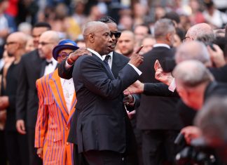 Denzel Washington discute com fotógrafo no tapete vermelho de Cannes